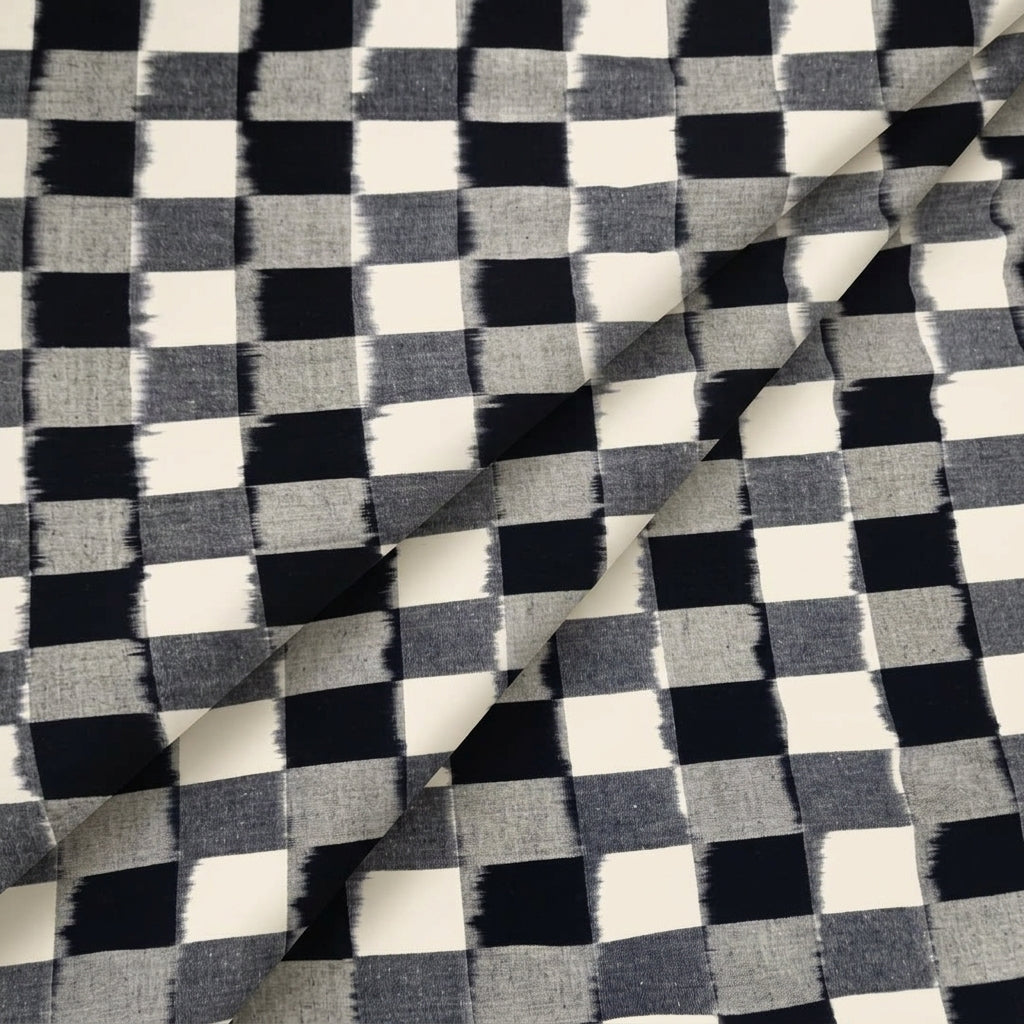 Folded White Ikat Cotton Fabric