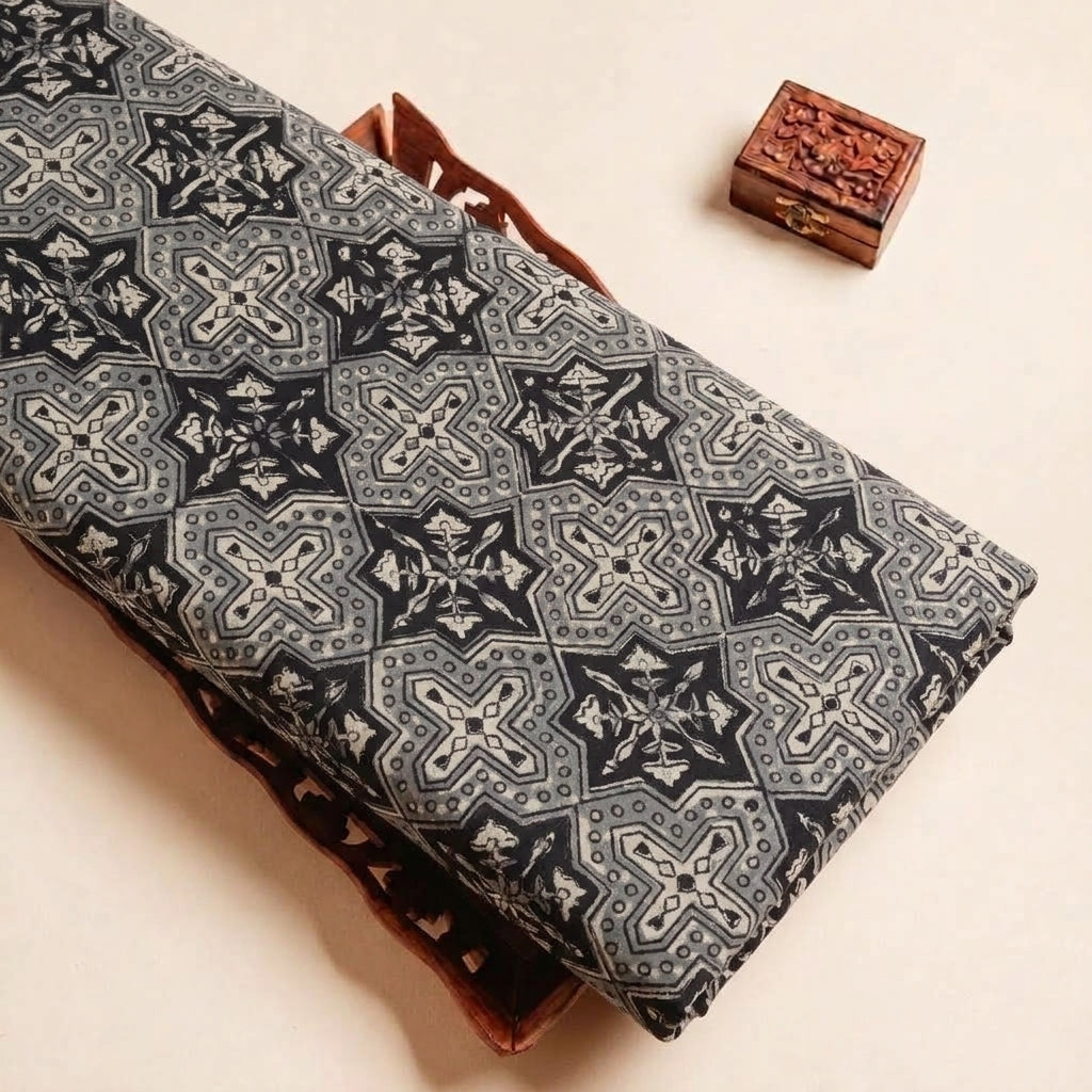 Folded Grey Kalamkari Cotton Fabric Highlighting Texture
