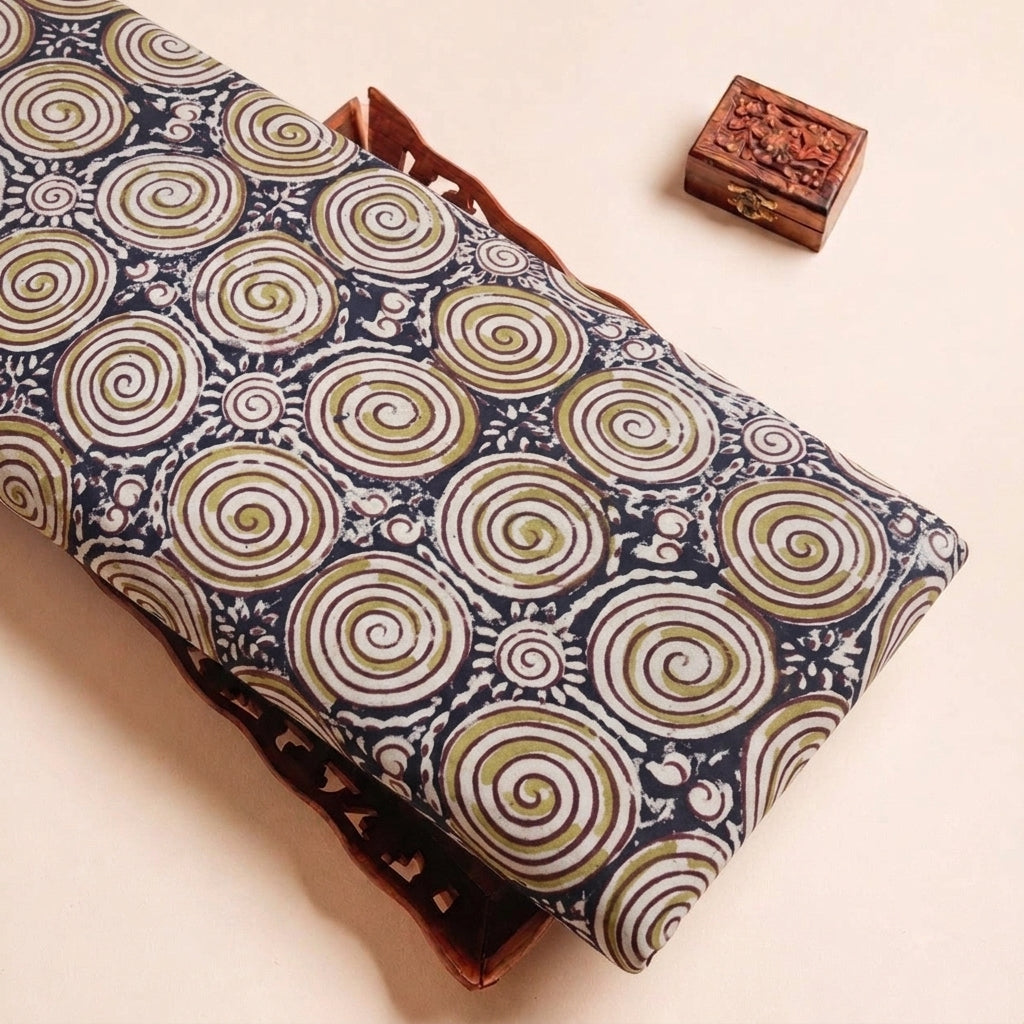 Folded Black Kalamkari Cotton Fabric Highlighting Texture