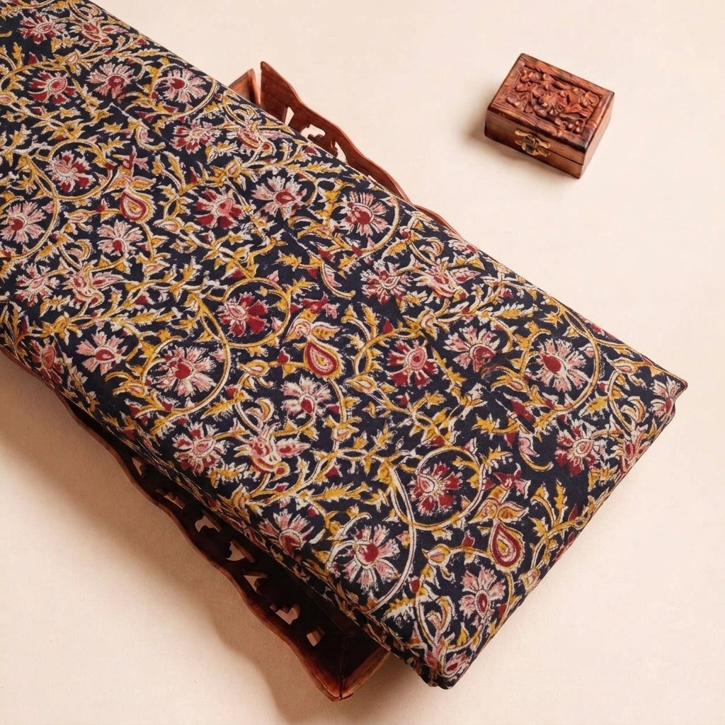 Folded Black Kalamkari Cotton Fabric Highlighting Texture