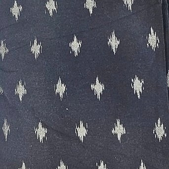 Black Ikat Cotton Fabric, laid flat