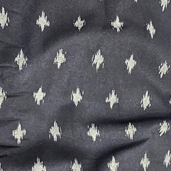 Black Ikat Cotton Fabric, laid flat