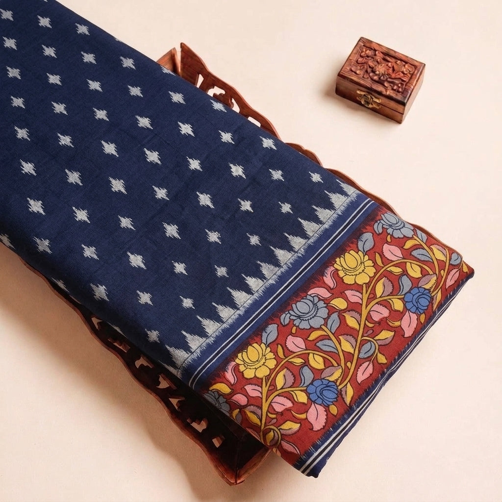 Folded Black Ikat Cotton Fabric Highlighting Border and Texture