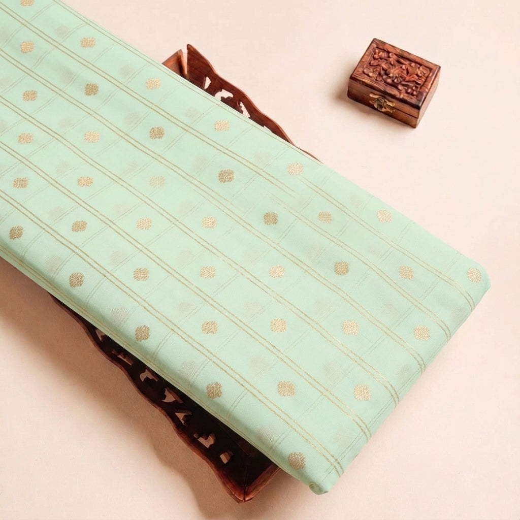 Folded Mint Green Checked Semi Banaras Fabric Highlighting Zari Butta and Texture