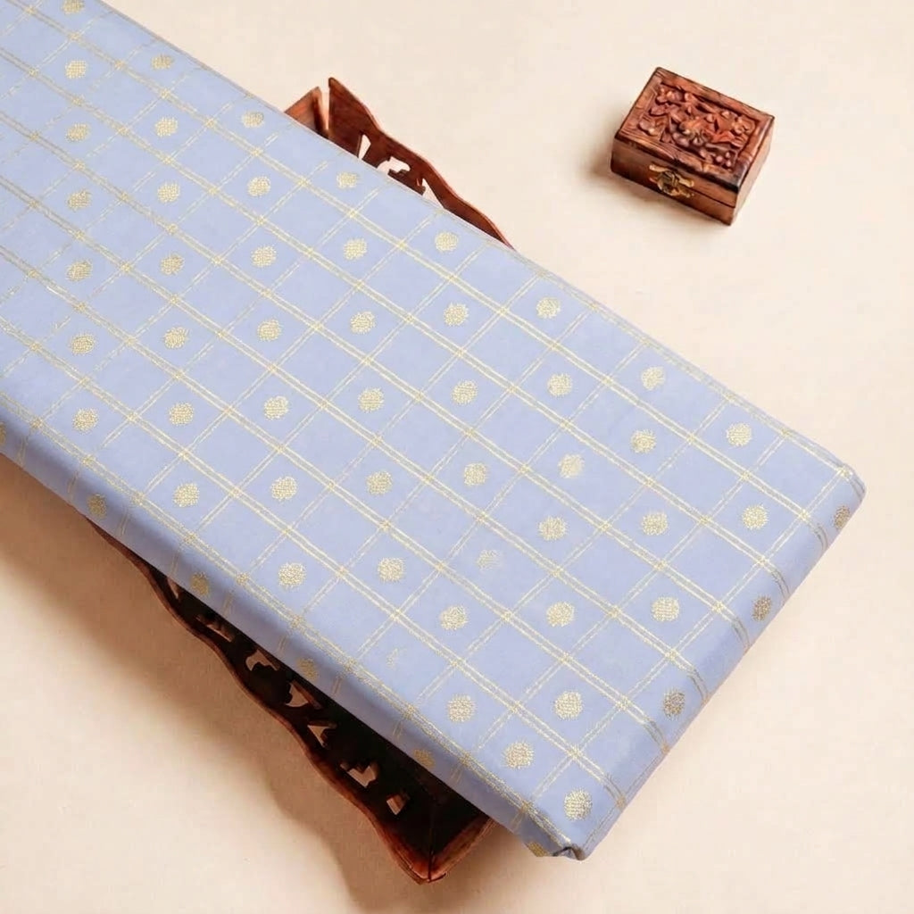 Folded Light Blue Checked Semi Banaras Fabric Highlighting Zari Butta and Texture