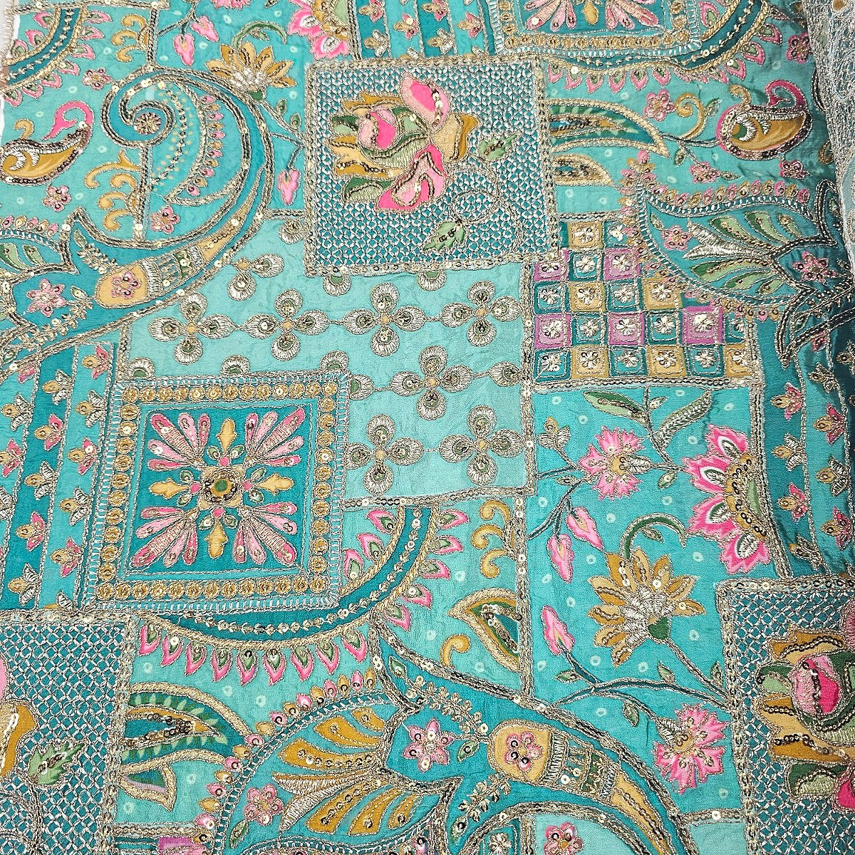 Green Embroidery Crepe Fabric, laid flat