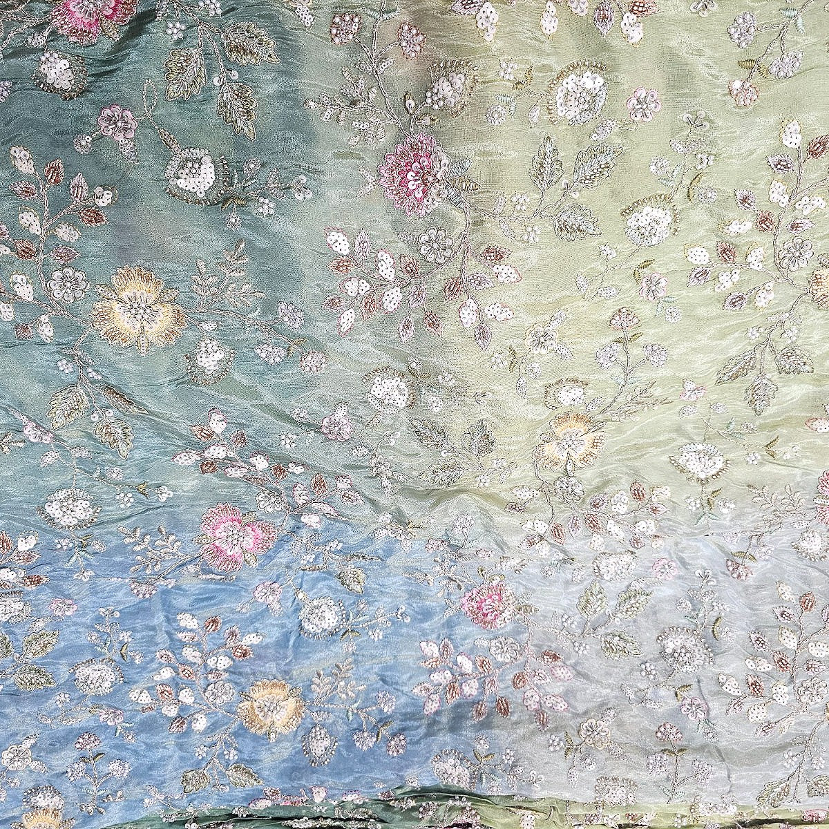 Green Blue Multicolor Chinnon Fabric, laid flat