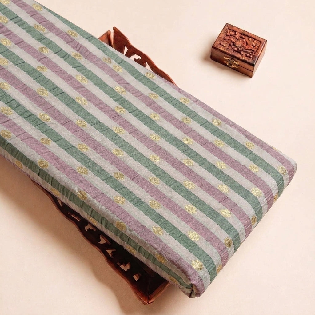 Folded Cream Stripes Semi Banaras Fabric Highlighting Zari Butta and Texture