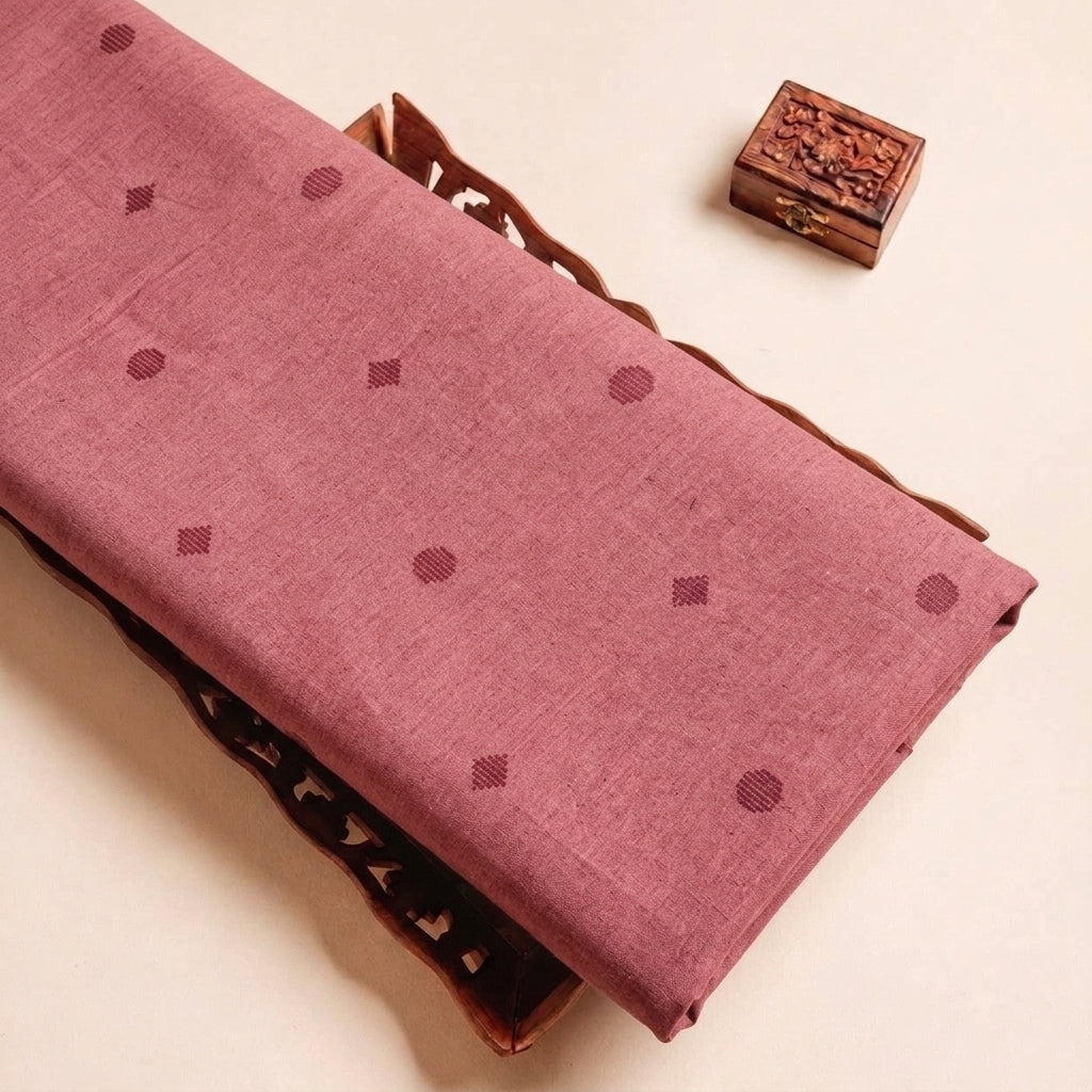 Folded Pink Printed Cotton Fabric Highlighting Texture