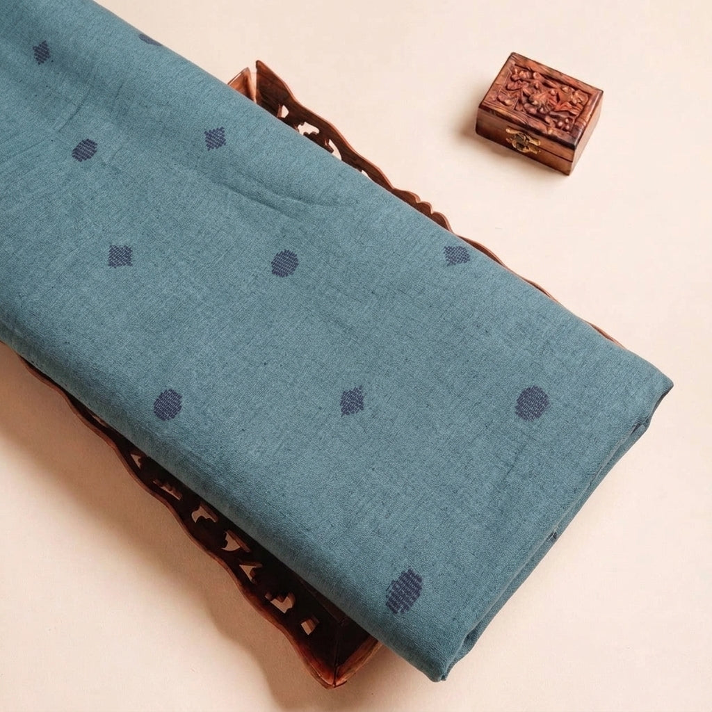 Folded Blue Printed Cotton Fabric Highlighting Texture