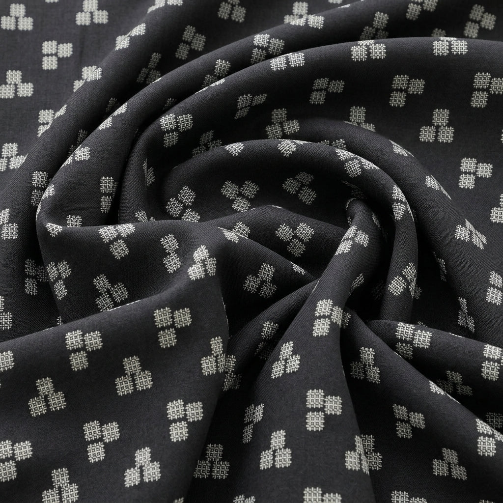 Swirled Black Abstract Rayon Fabric Showing Drape