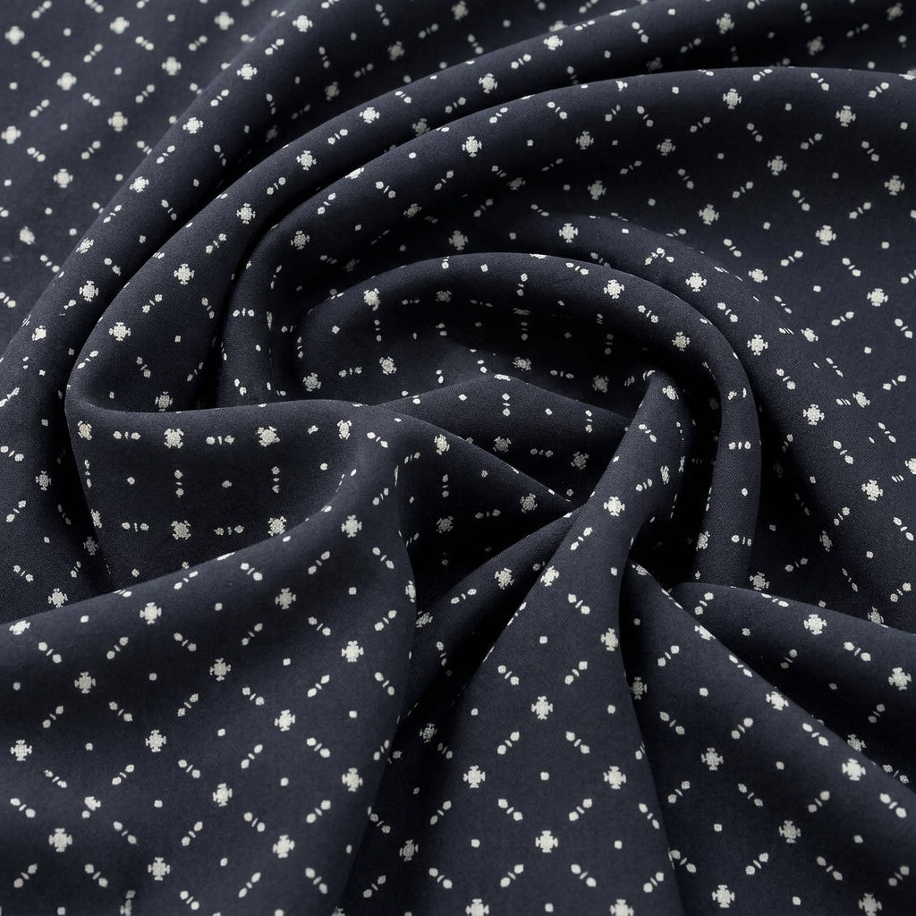 Swirled Black Diamond Rayon Fabric Showing Drape