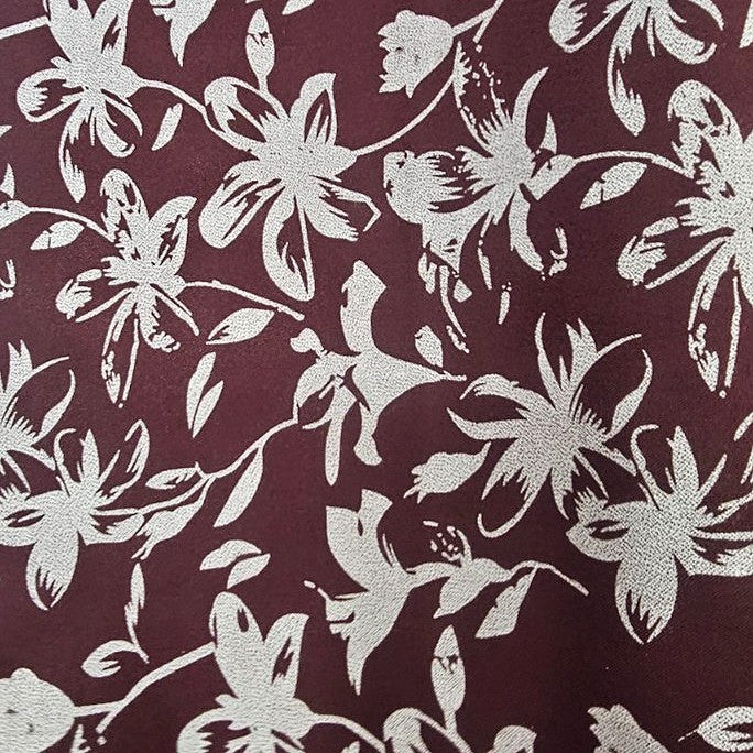 Maroon Floral Rayon Fabric, laid flat