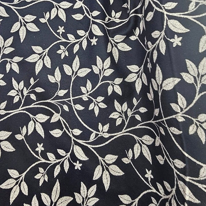 Black Floral Rayon Fabric, laid flat