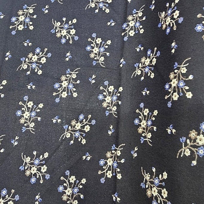 Black Floral Rayon Fabric, laid flat