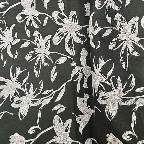 Green Floral Rayon Fabric, laid flat