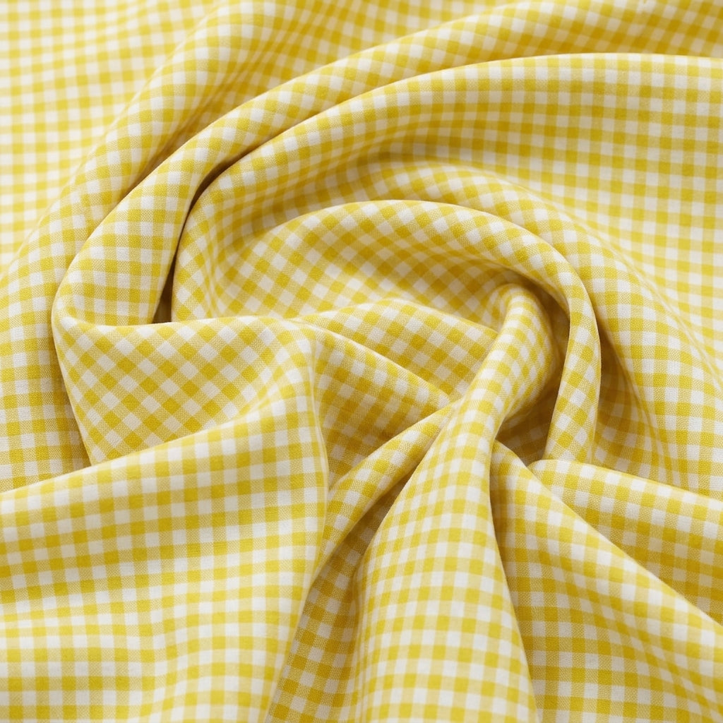 Swirled Yellow Checked Cotton Fabric Showing Drape