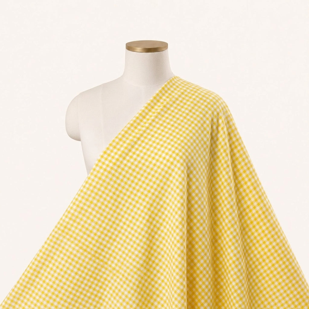 Yellow Checked Cotton Fabric Draped as a saree