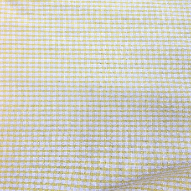 Light Yellow Checked Cotton Fabric, laid flat