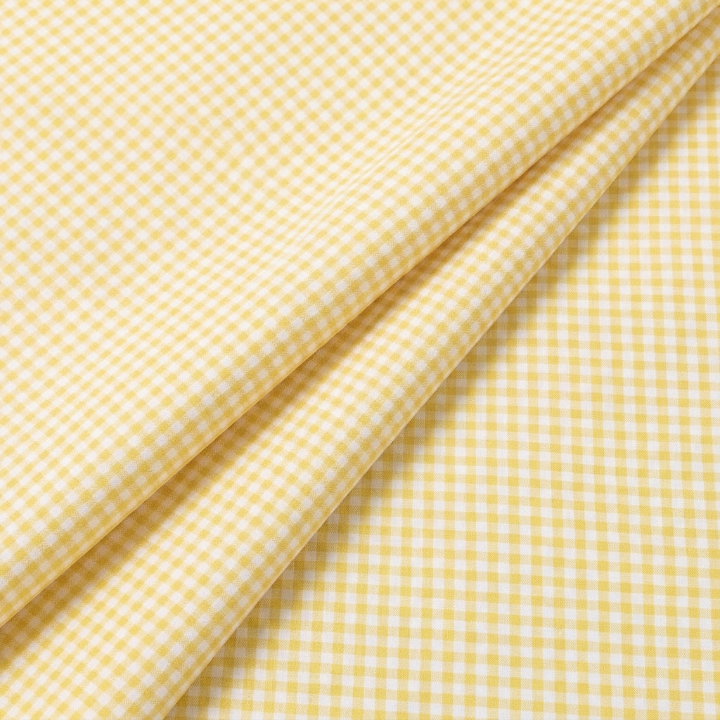 Folded Light Yellow Checked Cotton Fabric
