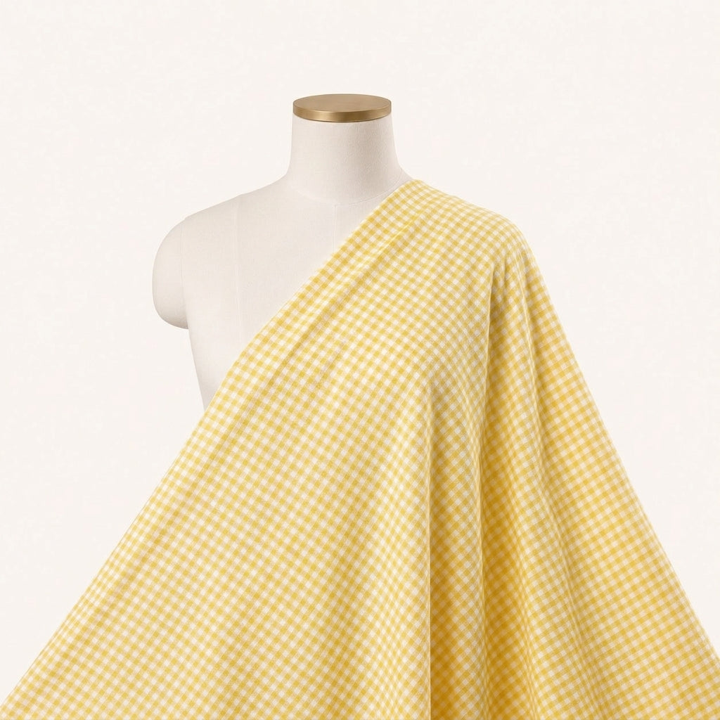 Light Yellow Checked Cotton Fabric Draped as a saree