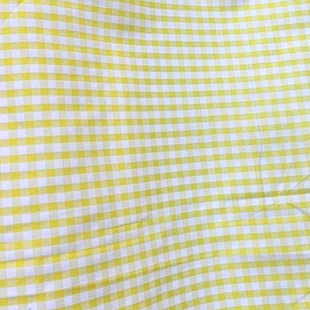 Yellow Checked Cotton Fabric, laid flat