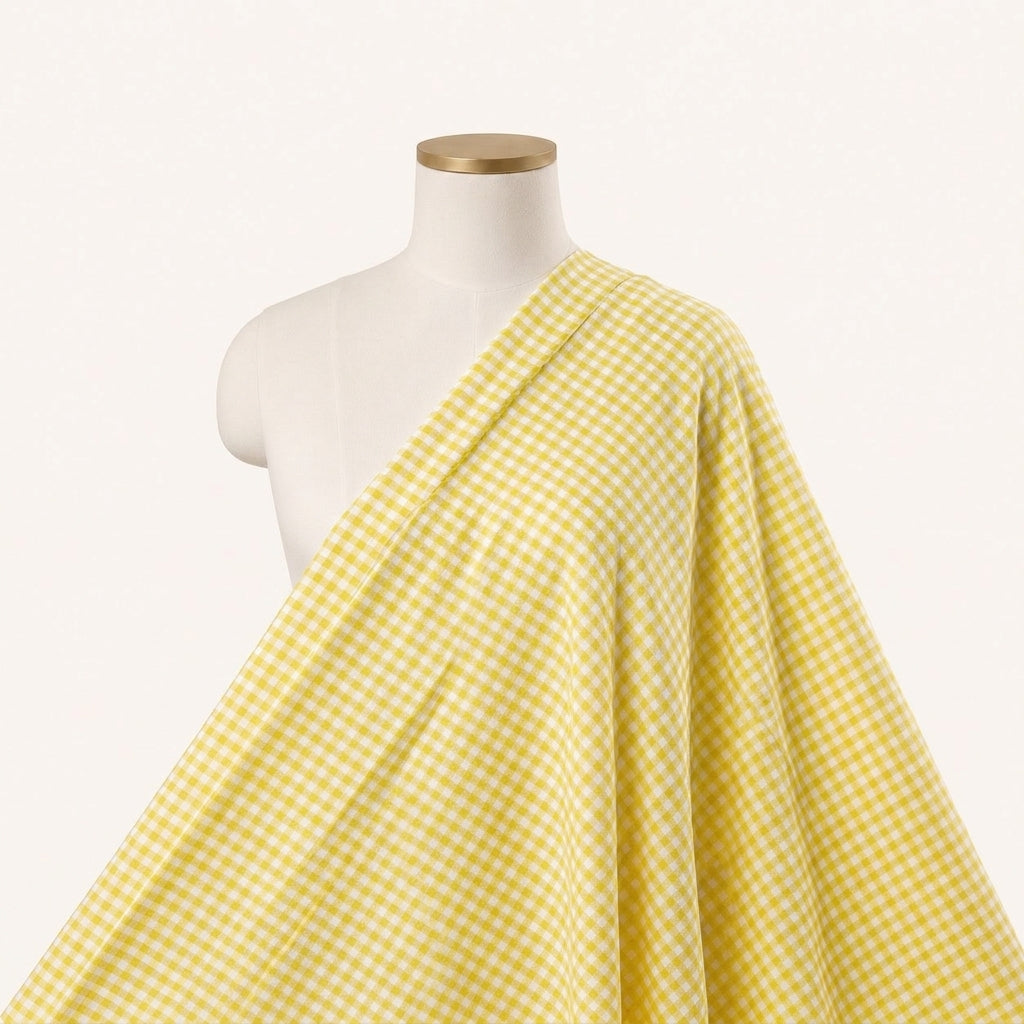 Yellow Checked Cotton Fabric Draped as a saree