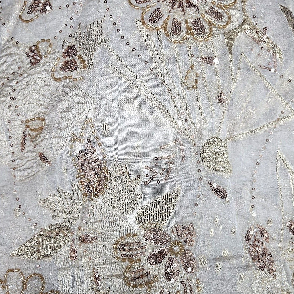 White Embroidery Tissue Fabric, laid flat