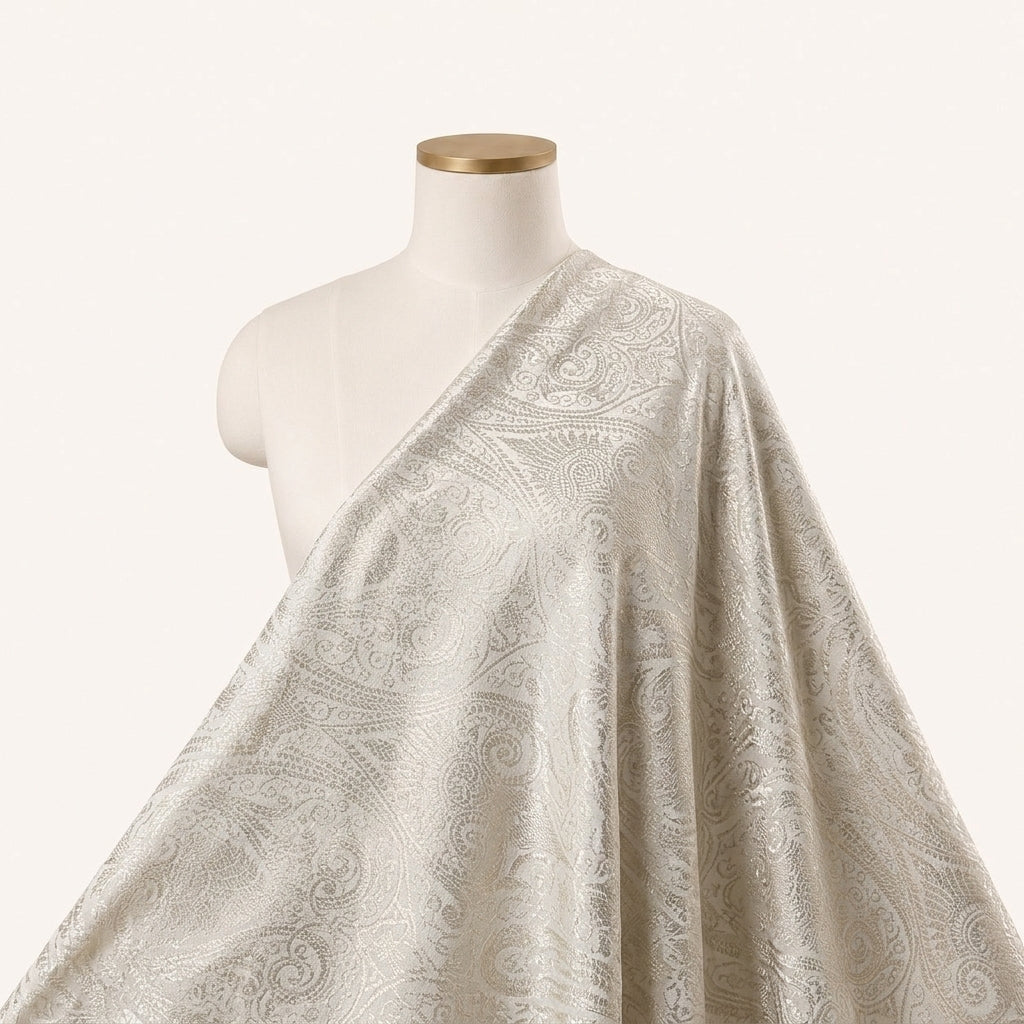 Cream Zari Semi Banaras Fabric Draped as a saree