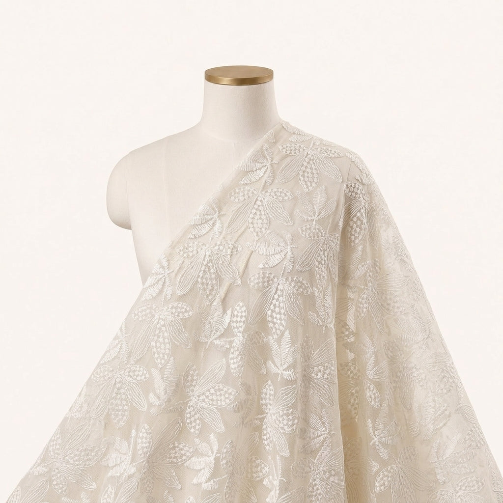 White Embroidery Net Fabric, draped as a saree