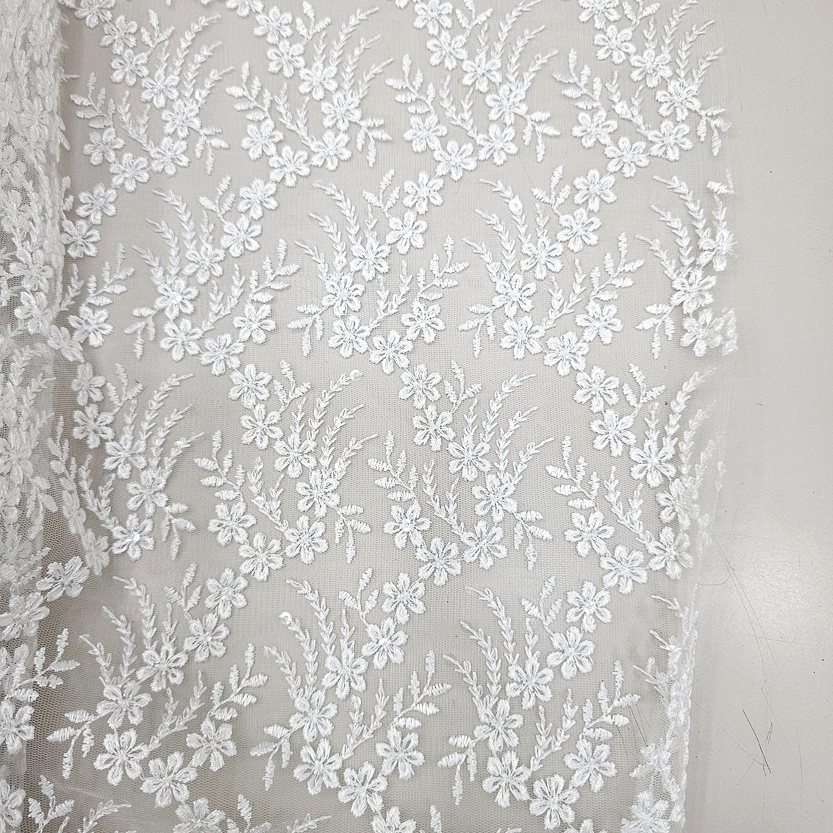 White Embroidery Net Fabric, laid flat