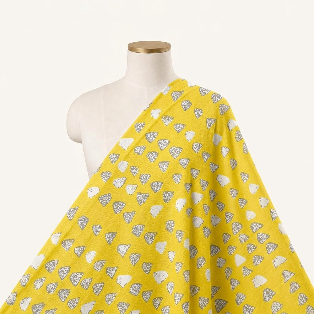 Printed Yellow Printed Cotton Fabric Draped as a saree