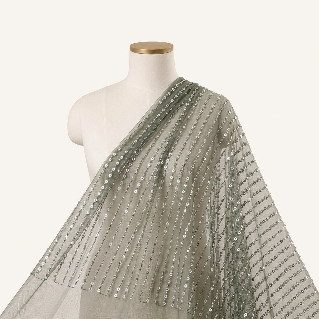 Embroidery Dark Green Embroidery Net Fabric Draped as a saree