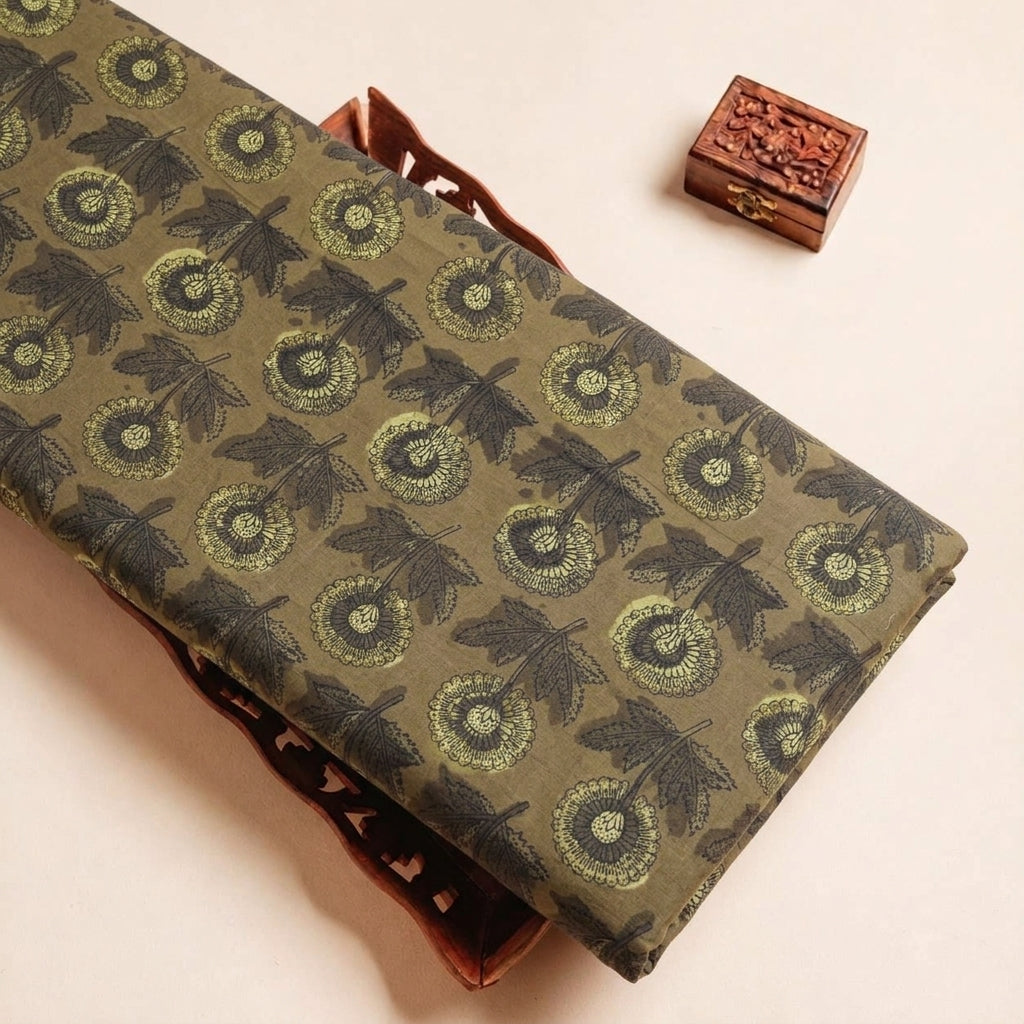Folded Dark Green Floral Cotton Fabric Highlighting and Texture