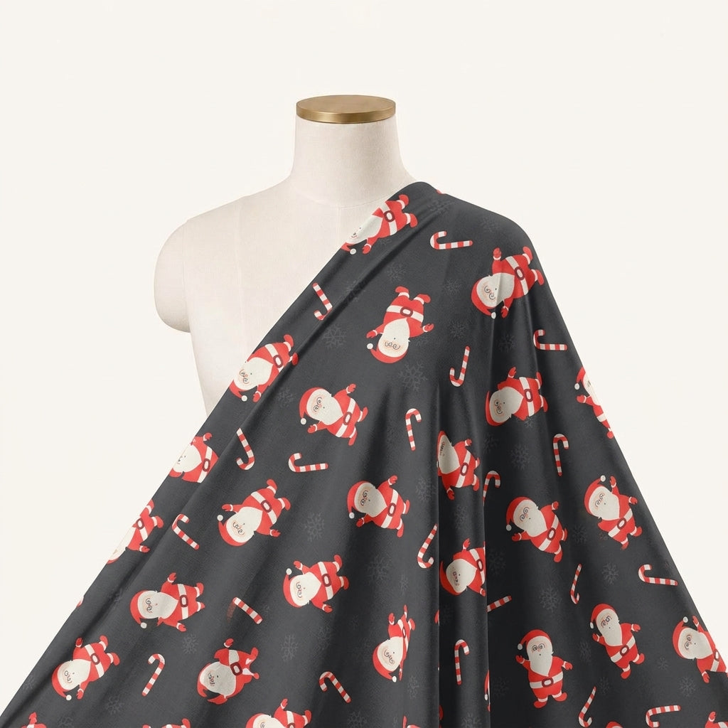 Printed Black Printed Satin Fabric Draped as a saree