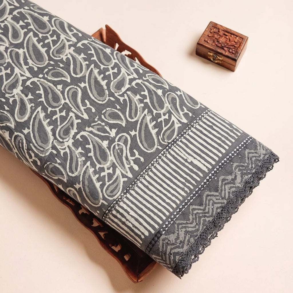 Ajrak Grey Ajrak Cotton Fabric on a wooden tray