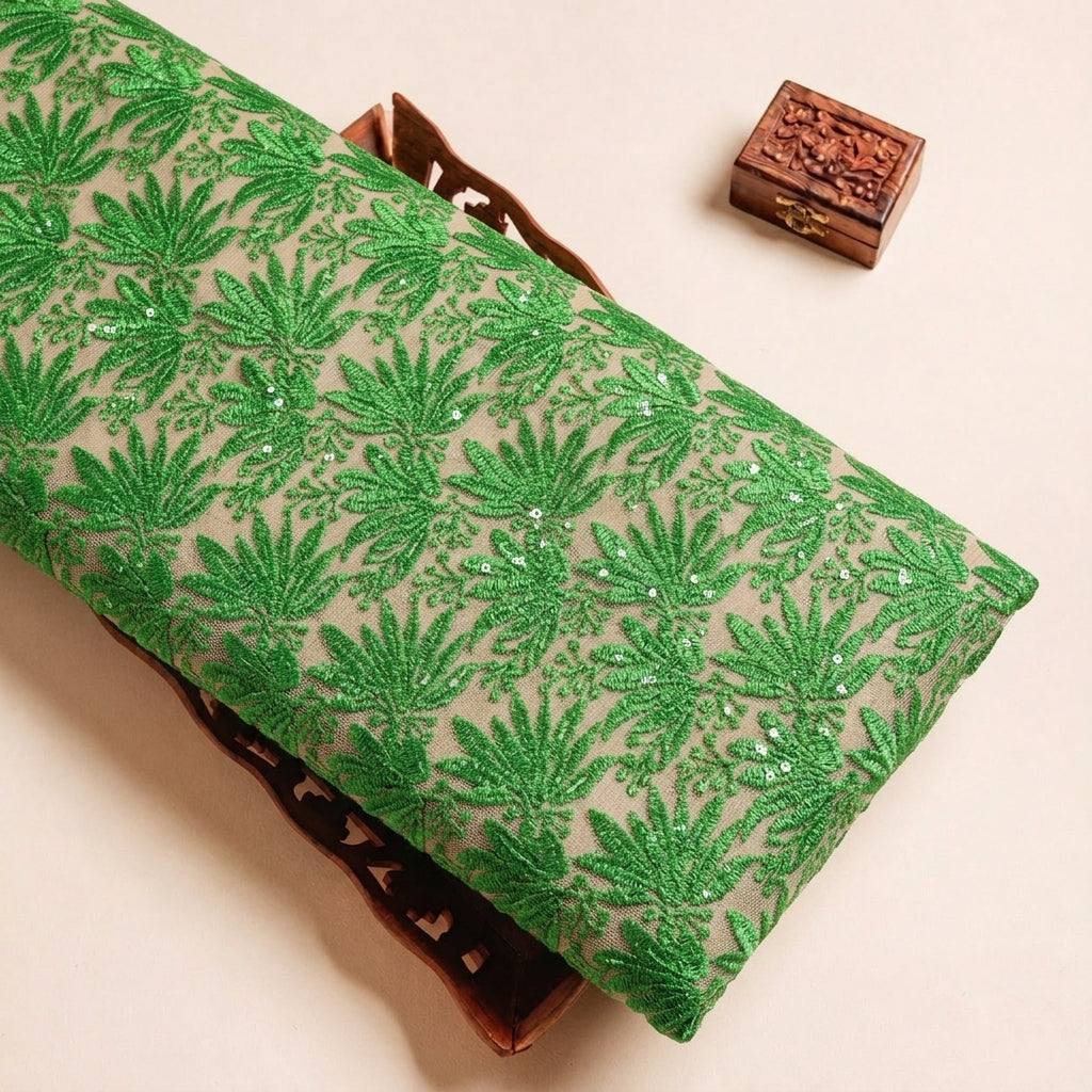 Folded Green Embroidery Net Fabric Highlighting Leaf Sequin and Texture