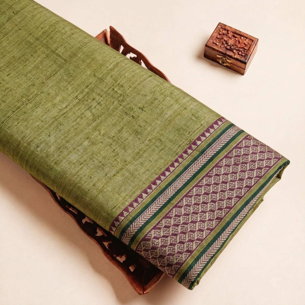 Folded Mustard Yellow Zari Border Cotton Fabric Highlighting Zari and Texture