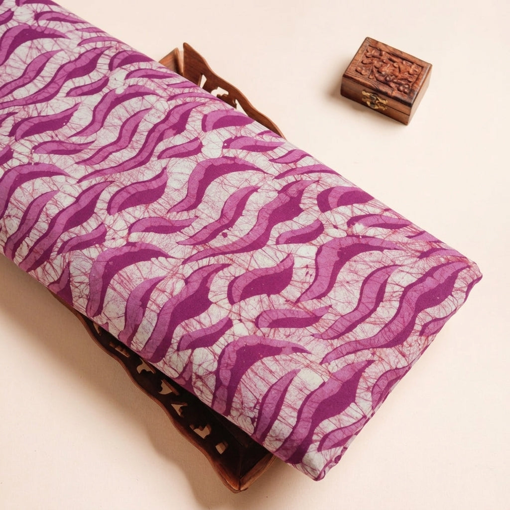 Batik Pink Batik Cotton Fabric on a wooden tray