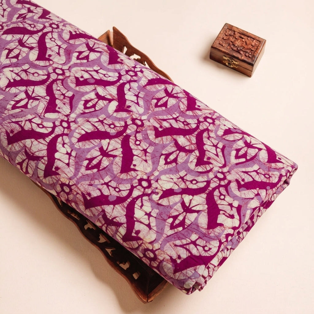 Batik Pink Batik Cotton Fabric on a wooden tray