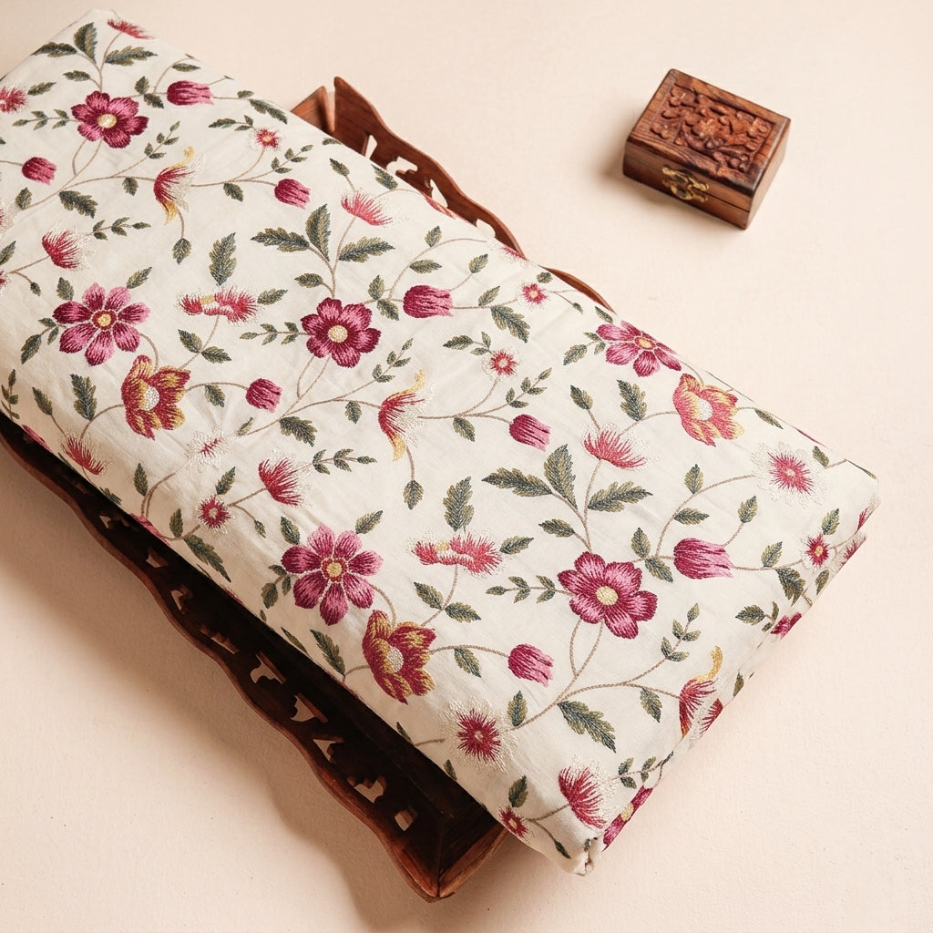 Embroidery Cream Embroidery Chanderi Cotton Fabric on a wooden tray