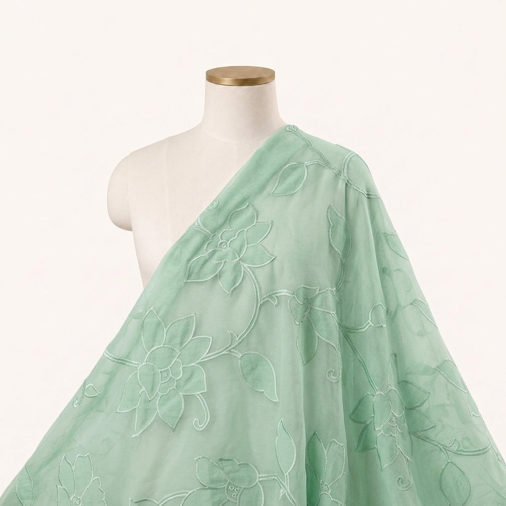 Embroidery Green Embroidery Tissue Fabric Draped as a saree
