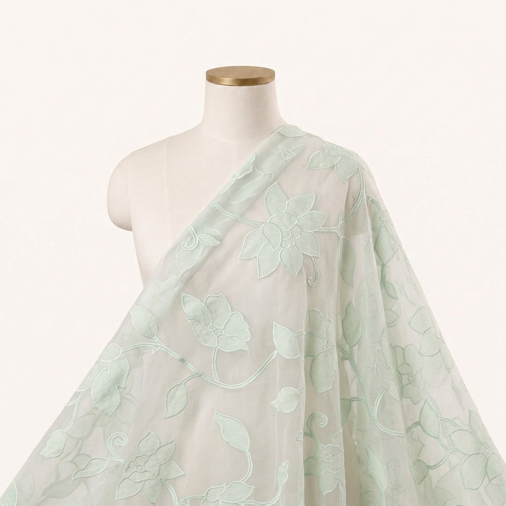 Embroidery Green Embroidery Tissue Fabric Draped as a saree