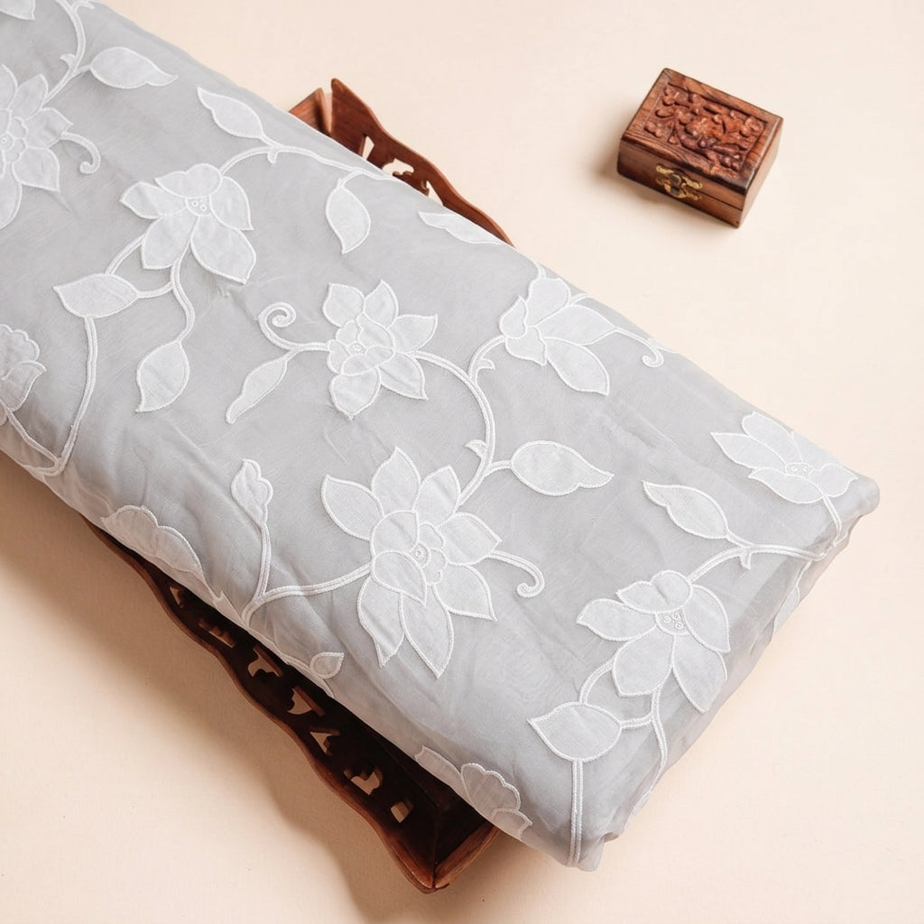 Embroidery White Embroidery Tissue Fabric on a wooden tray