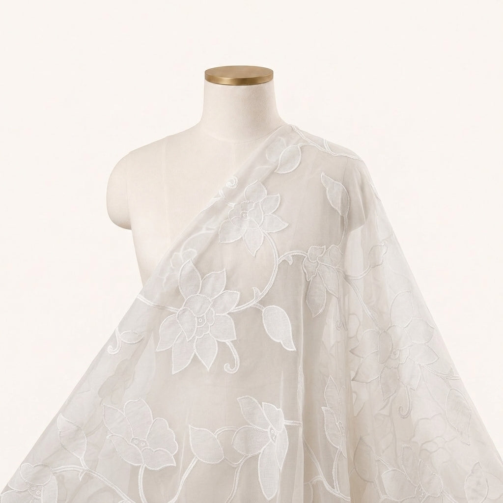 Embroidery White Embroidery Tissue Fabric Draped as a saree