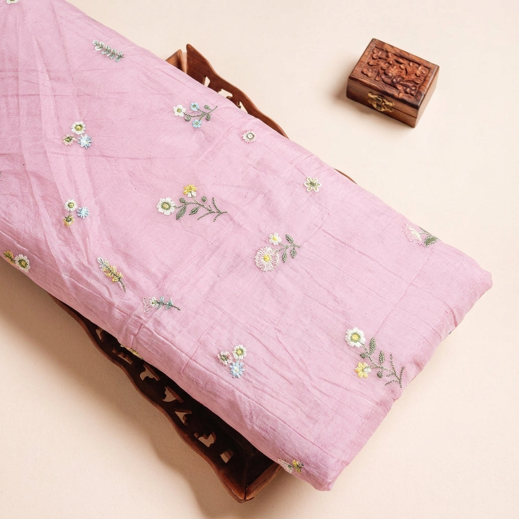 Embroidery Pink Embroidery Chanderi Cotton Fabric on a wooden tray