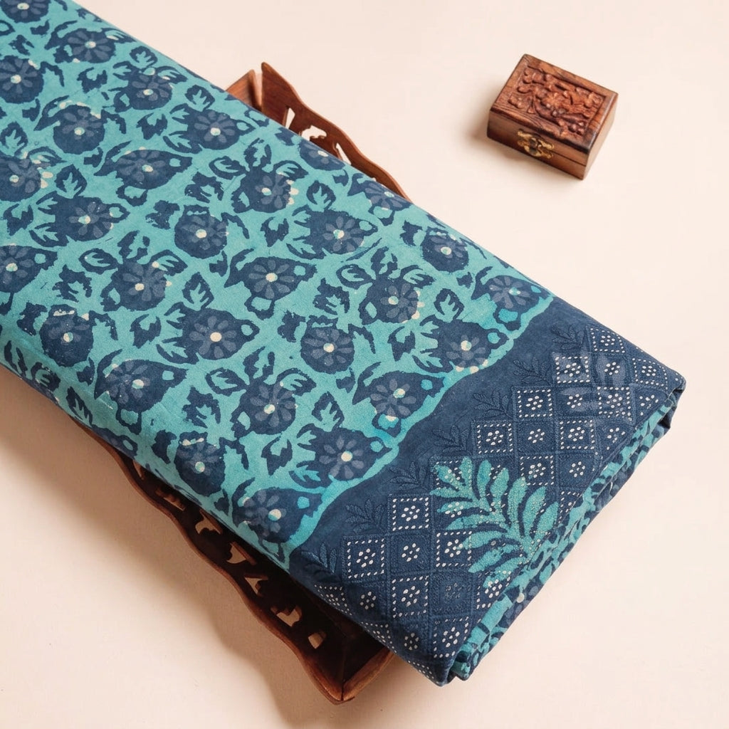 Batik Sea Blue Batik Cotton Fabric on a wooden tray