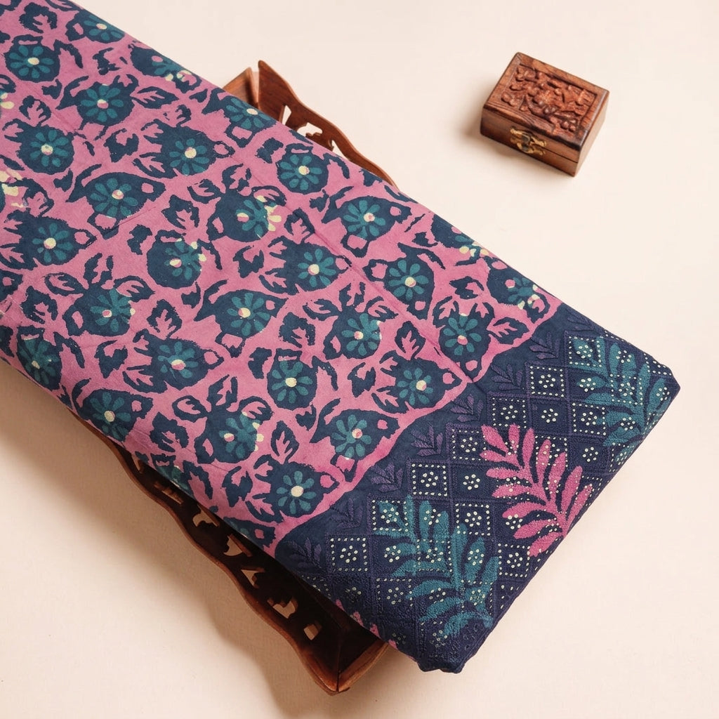 Batik Pink Batik Cotton Fabric on a wooden tray
