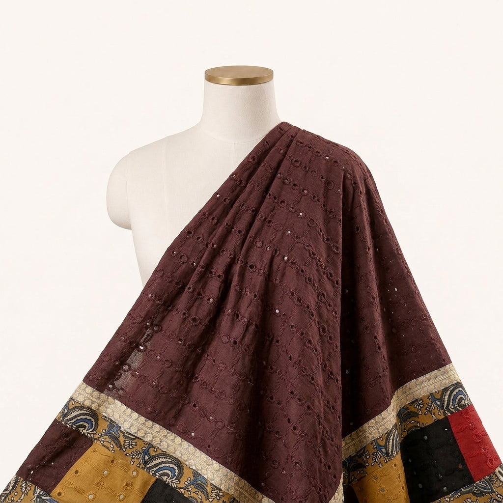Cutwork Maroon Cutwork Cotton Fabric Draped as a saree