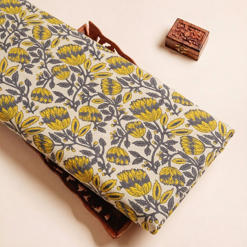 Folded Cream Ajrakh Cotton Fabric Highlighting Floral and Texture